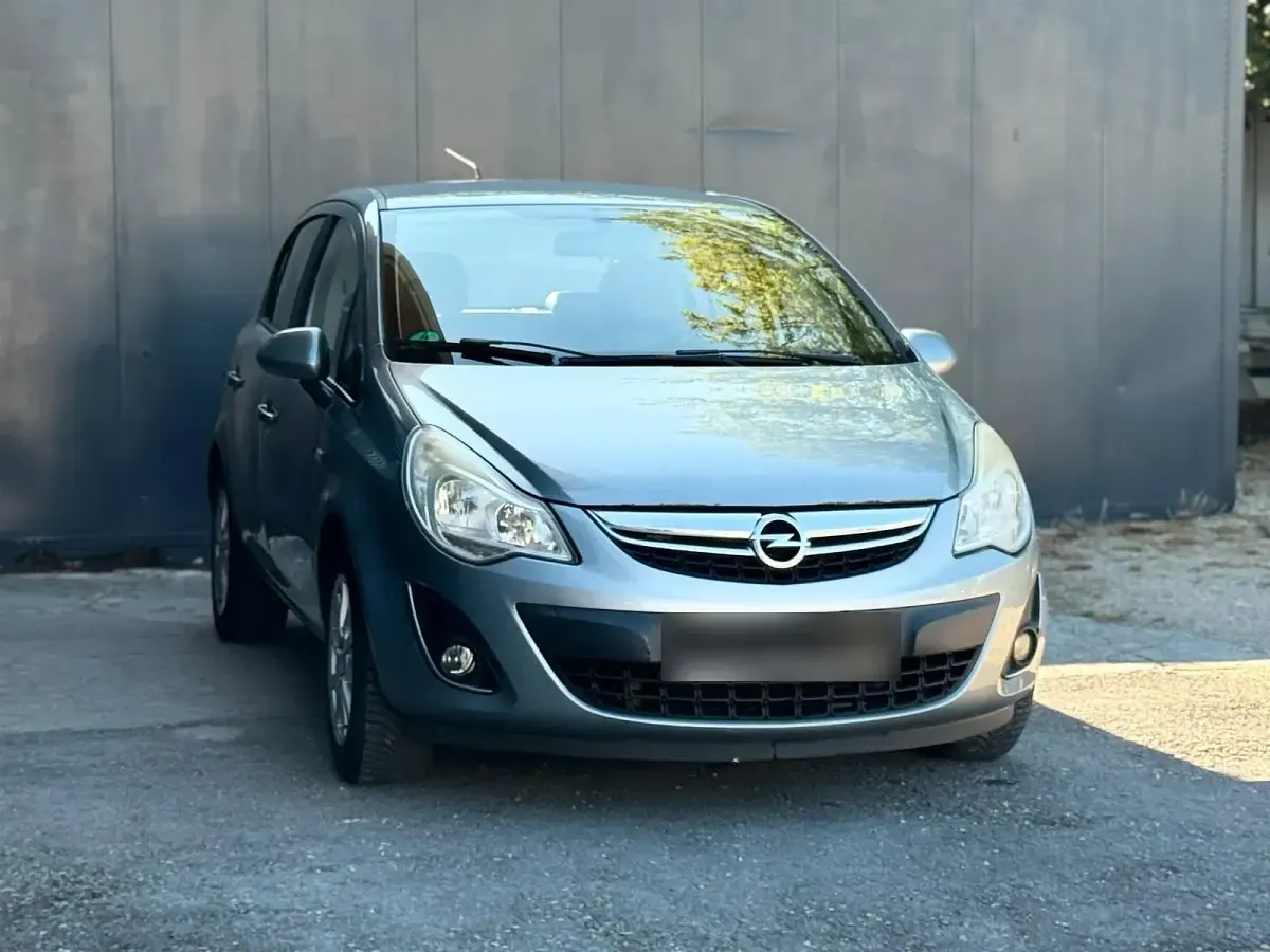 Usado Opel Corsa 86 HP (63 kW) 2012 Cinzento Citadino