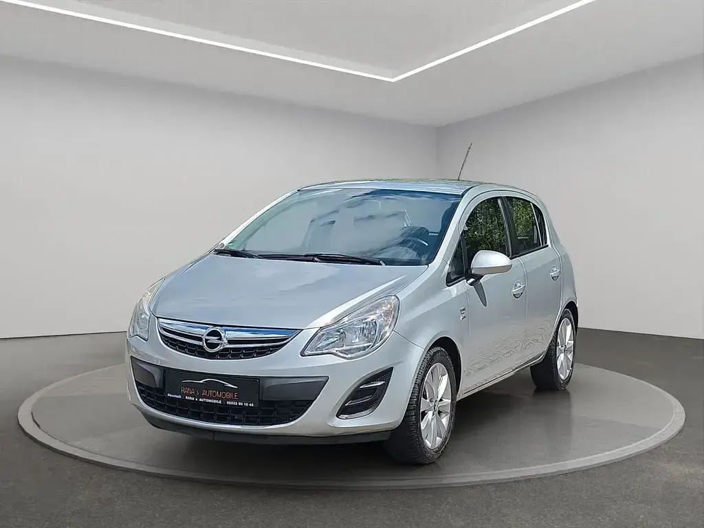 Gebraucht Opel Corsa Active 87 PS (63 kW) 2013 Silber Kleinwagen
