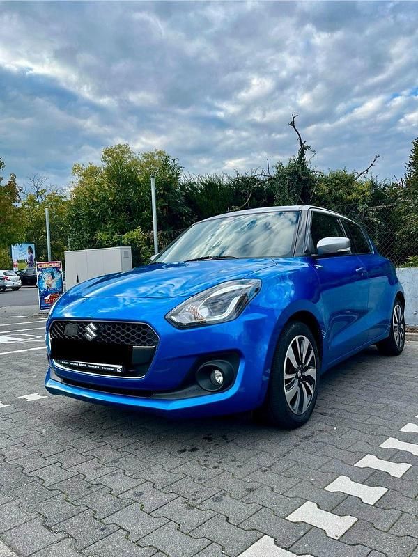 Blau Gebraucht 2019 Suzuki Swift Comfort+ Kleinwagen | 12.490 € (Fairer Preis) - Bild 1/4
