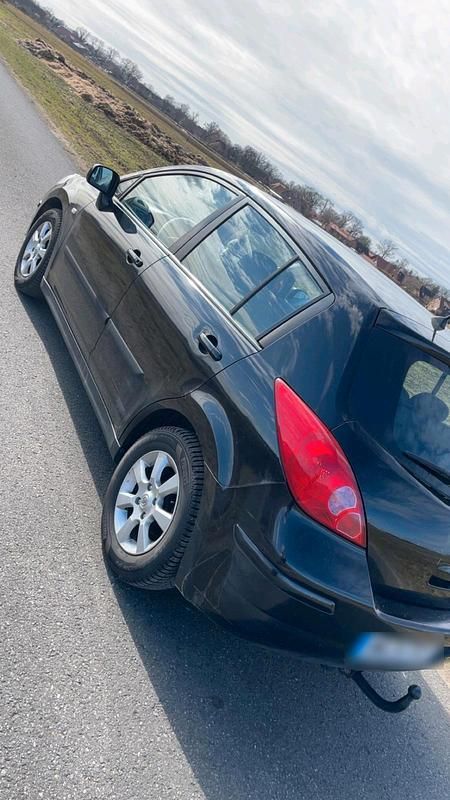 Gebraucht Nissan Tiida 126 PS (92 kW) 2008 Schwarz Kleinwagen
