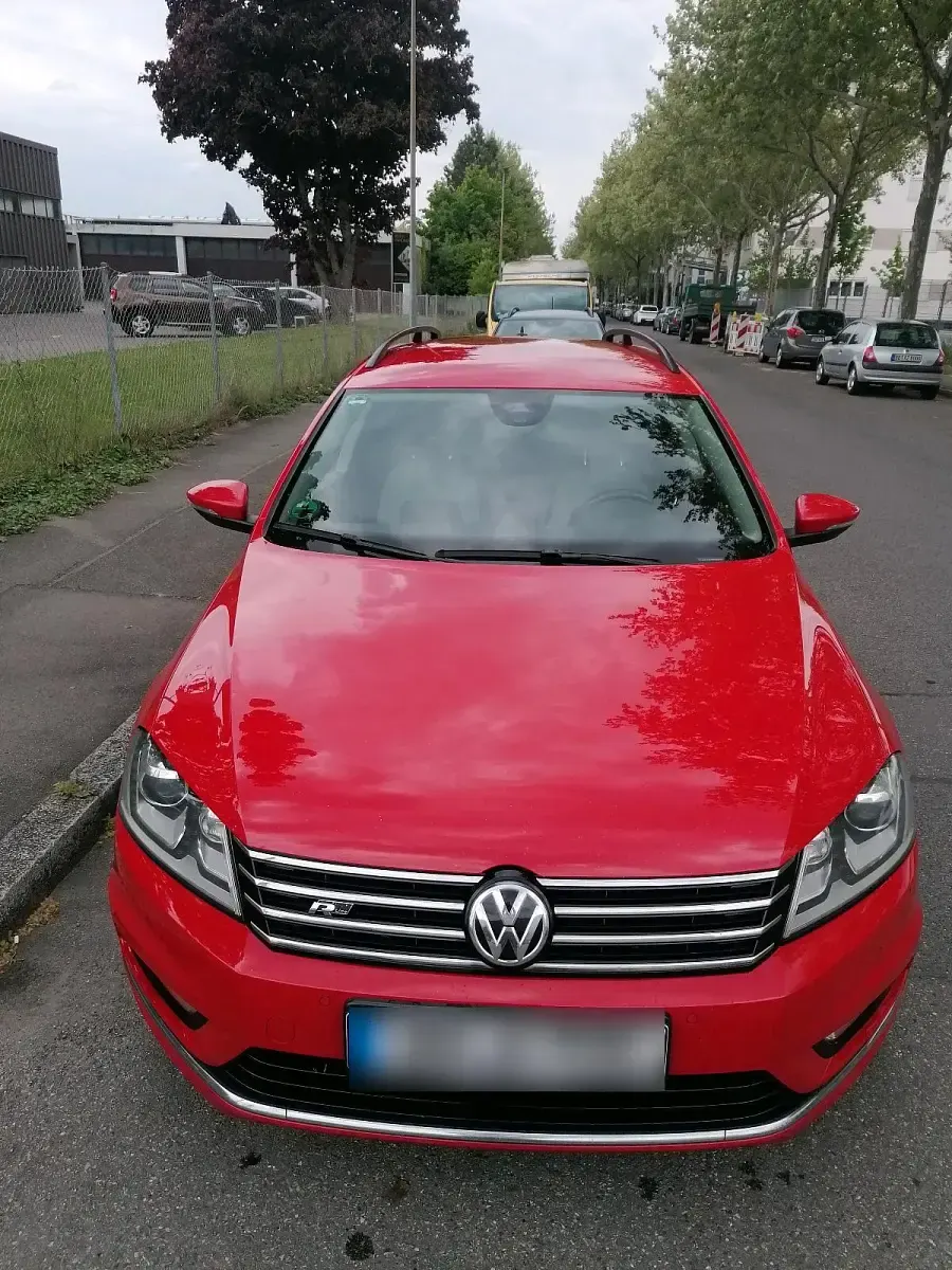 Używany VW Passat 150 KM (110 kW) 2014 Czerwony Kombi