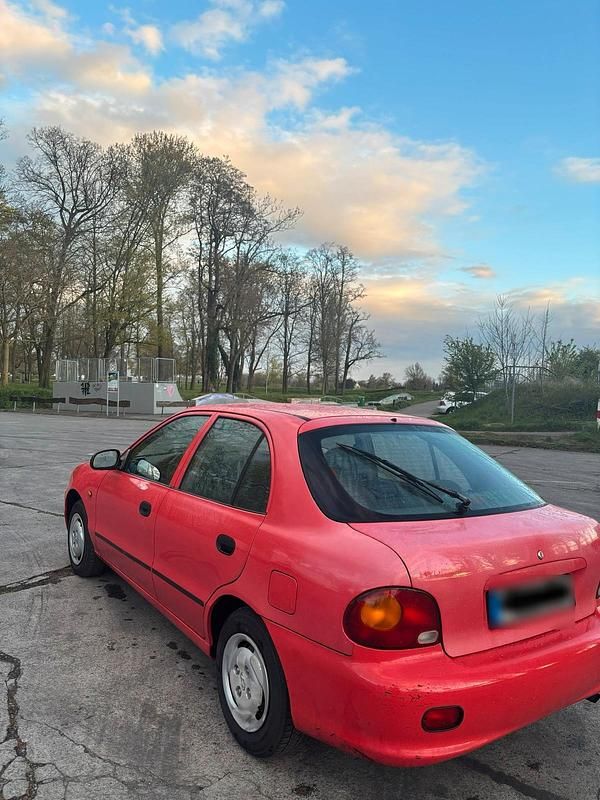 Gebraucht Hyundai Accent GLS 60 PS (44 kW) 1996 Rot Kleinwagen