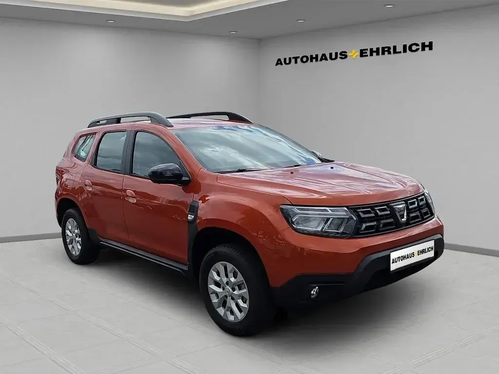 Używany Dacia Duster Comfort 101 KM (74 kW) 2022 Pomarańczowy SUV