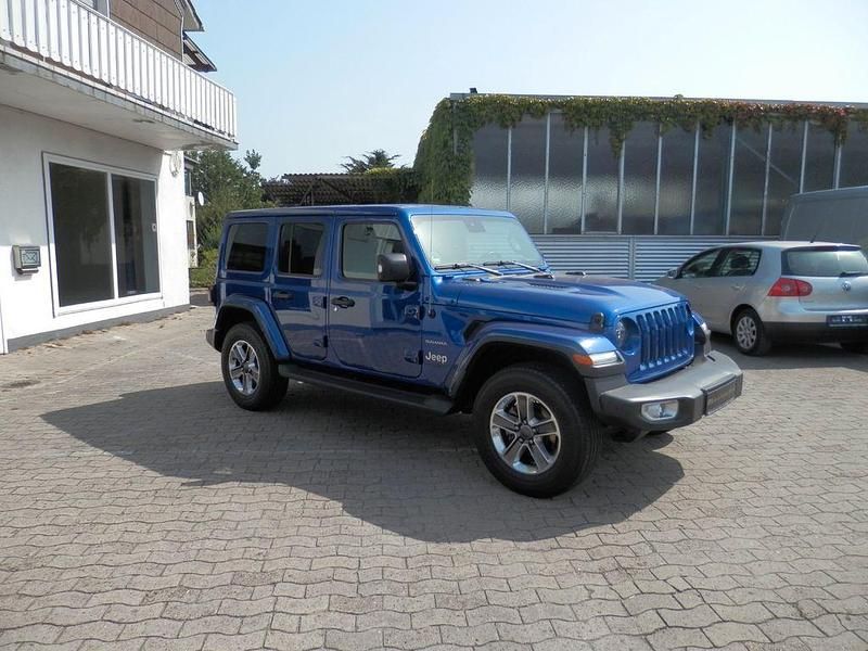 Blau Gebraucht 2019 Jeep Wrangler Unlimited Sahara SUV | 39.490 € (Fairer Preis) - Bild 1/4
