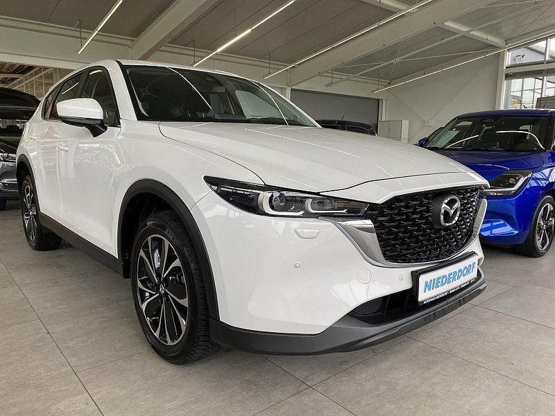 Rhodium white (metallic) Gebraucht 2024 Mazda CX-5 Ad'Vantage SUV | 33.990 € (Guter Preis) - Bild 1/4
