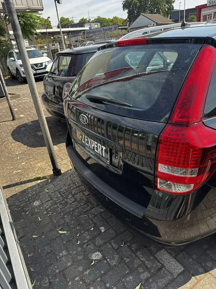 Gebraucht Kia Ceed Sportswagon Edition 7 125 PS (91 kW) 2011 Schwarz Kombi
