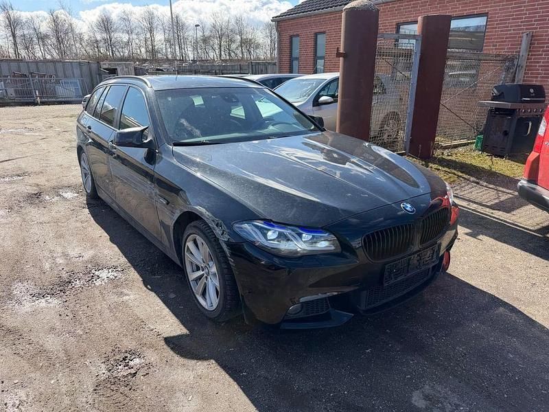 Gebraucht BMW 520 184 PS (135 kW) 2011 Schwarz Kombi