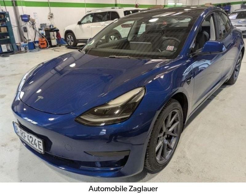 Blau Gebraucht 2021 Tesla Model 3 Standard Range Plus Limousine | 22.999 € (Guter Preis) - Bild 1/4