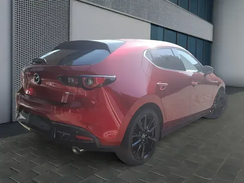 Używany Mazda 3 Exclusive 186 KM (136 kW) 2024 Czerwony Sedan/Limuzyna