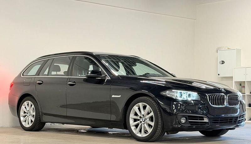Second-hand BMW 520 Luxury Line 190 CP (139 kW) 2015 Negru Berlinǎ