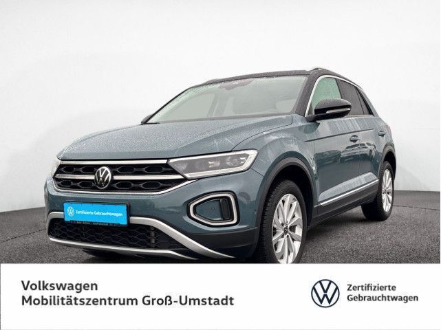 Petroleum blue metallic Gebraucht 2024 VW T-Roc Style SUV | 29.990 € (Fairer Preis) - Bild 1/4