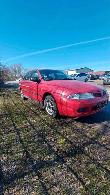 Gebraucht Mitsubishi Carisma 120 PS (88 kW) 1999 Rot Limousine