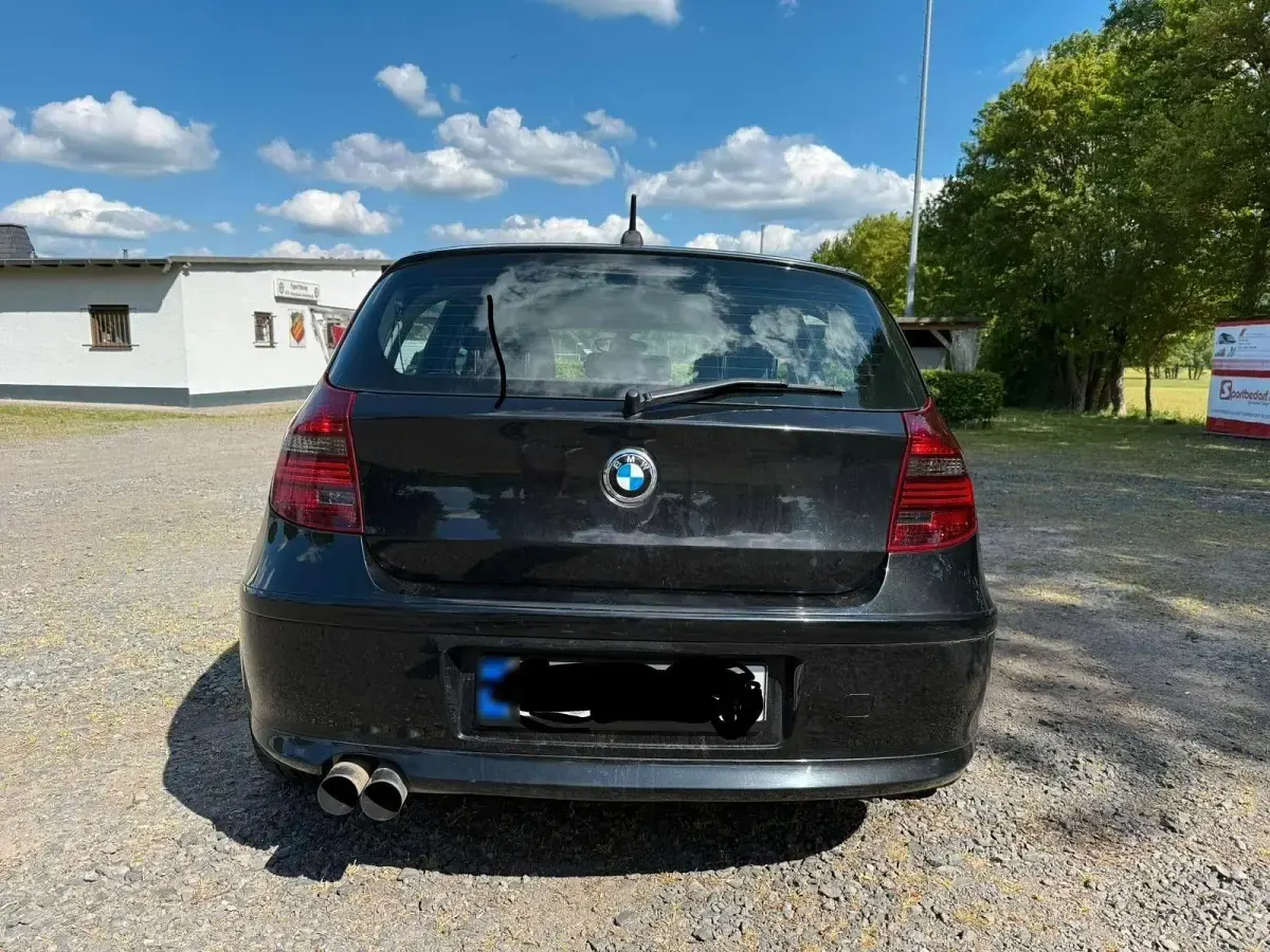 Używany BMW 116 Advantage 122 KM (89 kW) 2010 Czarny Hatchback