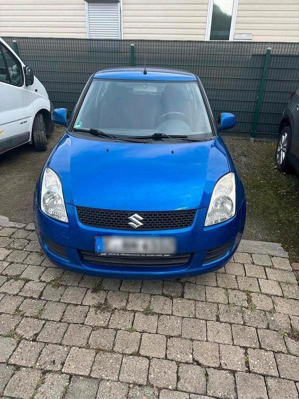 Blau Gebraucht 2009 Suzuki Swift Kleinwagen | 600 € (Superpreis) - Bild 1/4