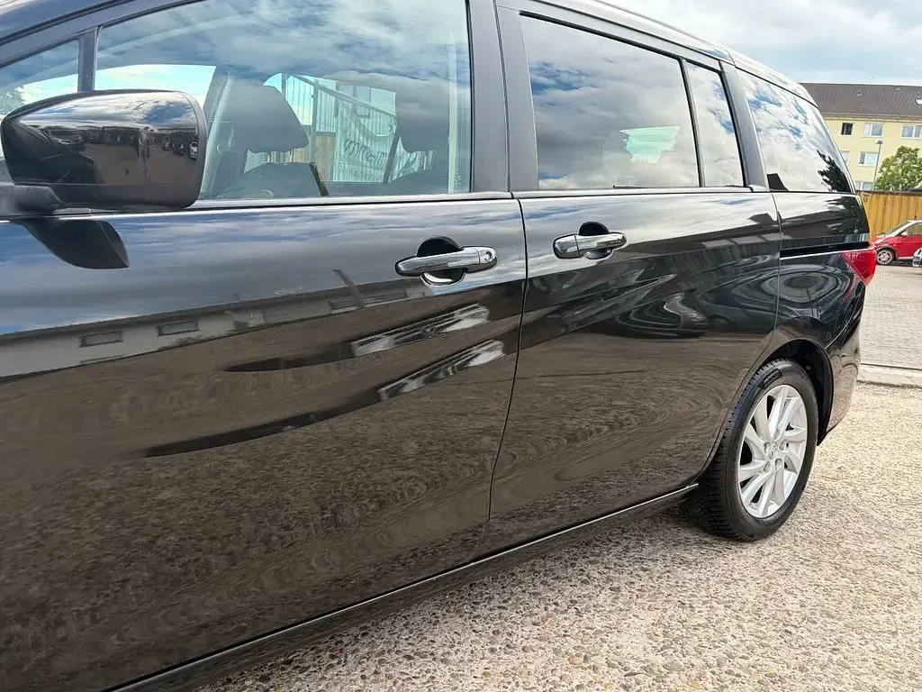 Gebraucht Mazda 5 Center-Line 144 PS (105 kW) 2012 Anubisschwarz metallic Van / Kleinbus
