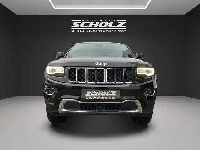 Gebraucht Jeep Grand Cherokee 250 PS (183 kW) 2014 Brilliant black (perleffekt) SUV
