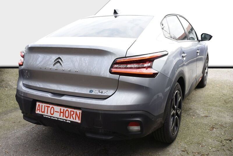Gebraucht Citroën e-C4 Shine 100 kW (136 PS) 2023 Stahlgrau metallic Limousine