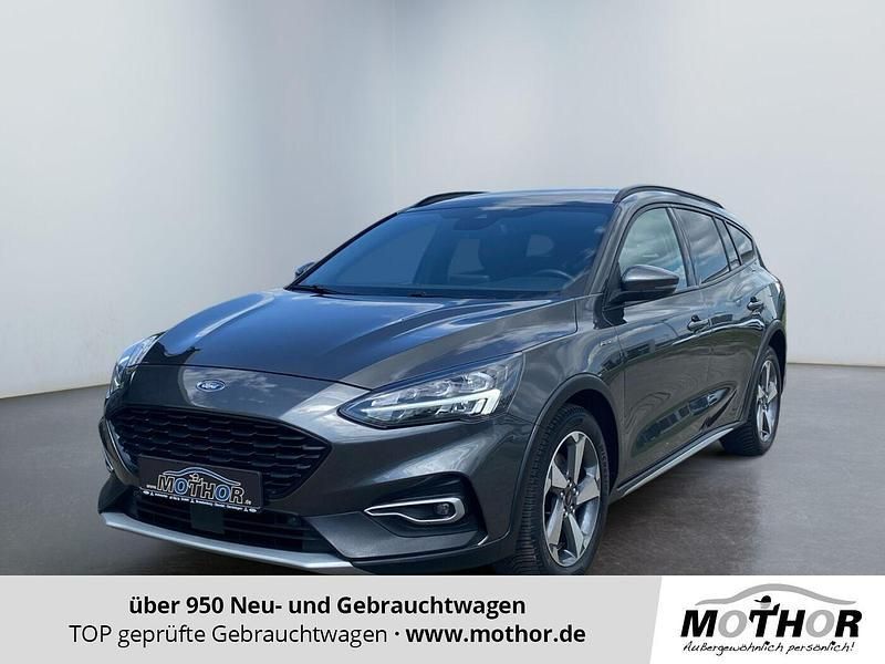 Magnetic grau Gebraucht 2021 Ford Focus Active X Limousine | 21.879 € (Teuer) - Bild 1/4