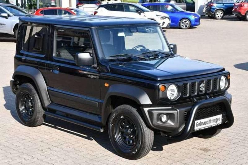 Bluish black pearl metallic 3 Gebraucht 2018 Suzuki Jimny Comfort SUV | 26.490 € (Fairer Preis) - Bild 1/4