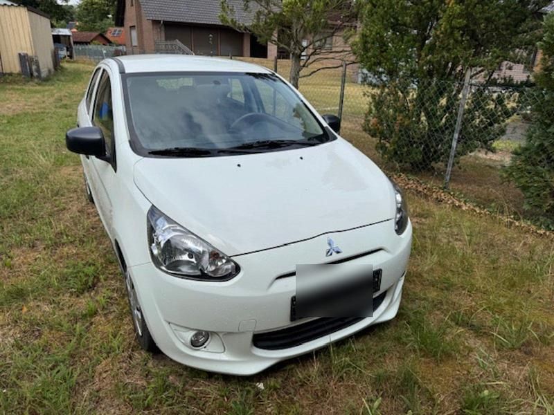 Weiß Gebraucht 2014 Mitsubishi Space Star Kleinwagen | 2.600 € (Fairer Preis) - Bild 1/4