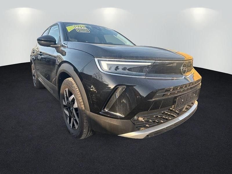 Gebraucht Opel Mokka-e Elegance 100 kW (136 PS) 2022 Diamant schwarz/karbon schwarz SUV