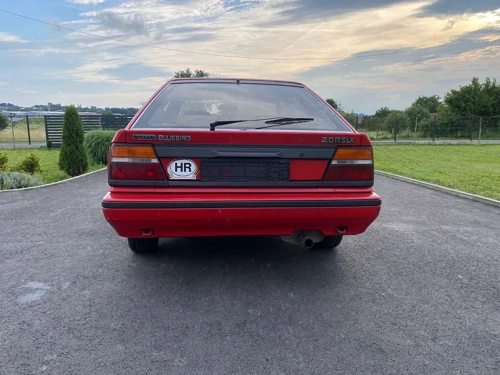 Gebraucht Nissan Bluebird 60 PS (44 kW) 1994 Rot Limousine