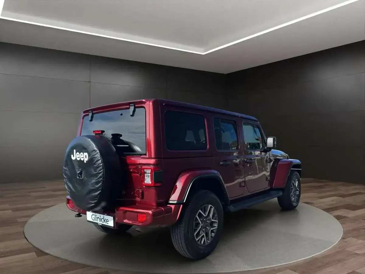 Gebraucht Jeep Wrangler Sahara 272 PS (200 kW) 2021 Snazzberry (metallic) SUV