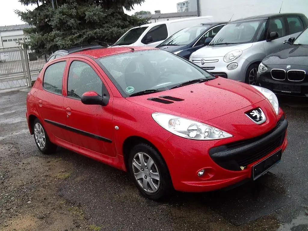 Gebraucht Peugeot 206 Basis 60 PS (44 kW) 2009 Rot Limousine