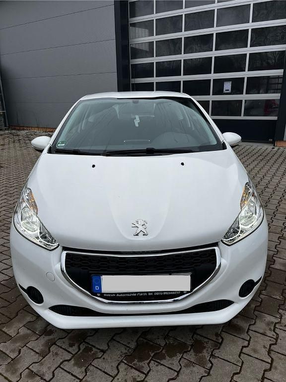 Weiß Gebraucht 2014 Peugeot 208 Kleinwagen | 6.900 € (Fairer Preis) - Bild 1/4