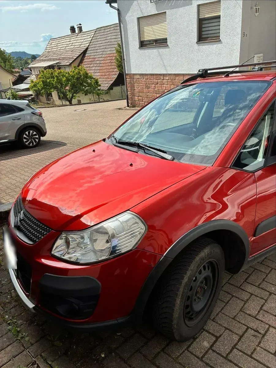 Gebraucht Suzuki SX4 Comfort 120 PS (88 kW) 2011 Orange Kleinwagen