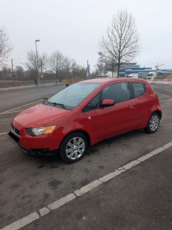 Gebraucht Mitsubishi Colt Top 95 PS (69 kW) 2011 Rot Kleinwagen