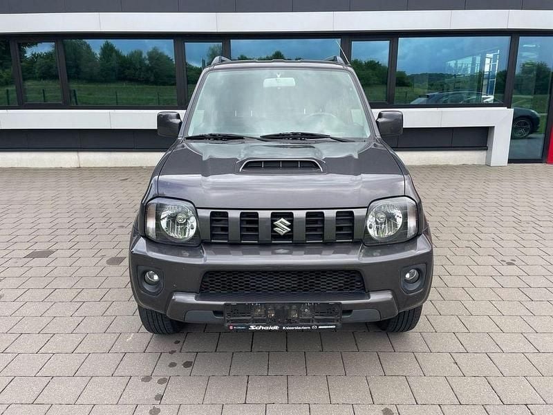Grau Gebraucht 2018 Suzuki Jimny Style SUV | 9.600 € (Superpreis) - Bild 1/4