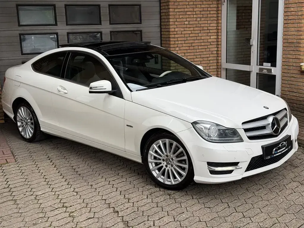Gebraucht Mercedes C250 AMG line 204 PS (150 kW) 2011 Weiß Coupé
