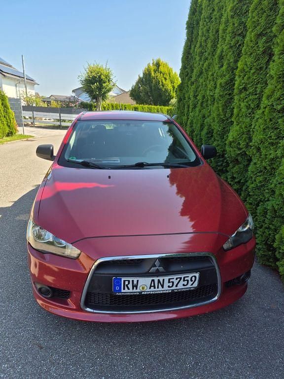 Rot Gebraucht 2010 Mitsubishi Lancer Limousine | 4.999 € (Fairer Preis) - Bild 1/4