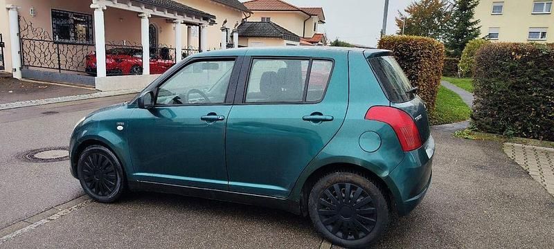 Grün Gebraucht 2006 Suzuki Swift Comfort+ Limousine | 2.450 € (Fairer Preis) - Bild 1/4