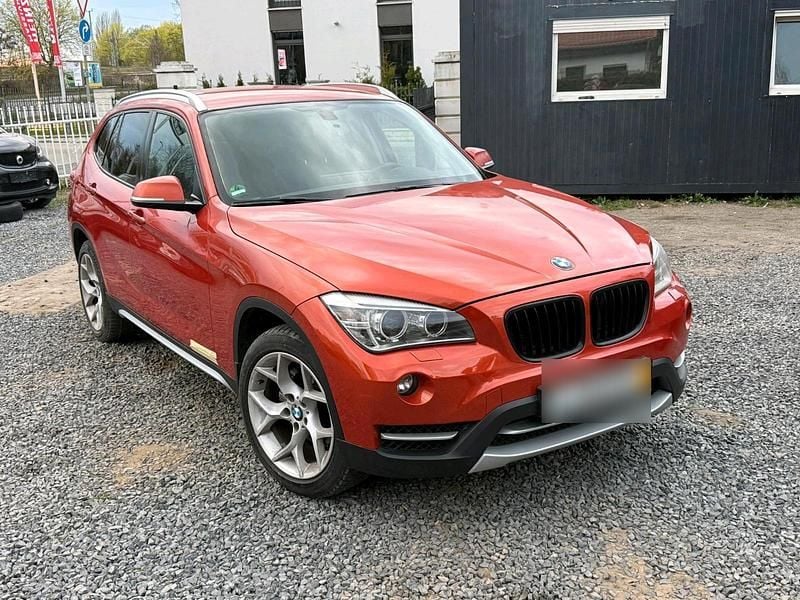 Second-hand BMW X1 177 CP (130 kW) 2012 Portocaliu SUV