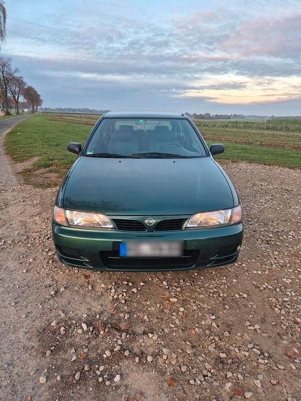 Grün Gebraucht 1997 Nissan Almera Kleinwagen | 2.350 € - Bild 1/4