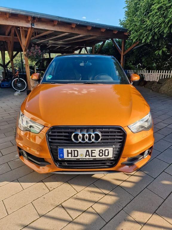 Orange Gebraucht 2012 Audi A1 Sportback S-Line Kleinwagen | 8.950 € (Fairer Preis) - Bild 1/4