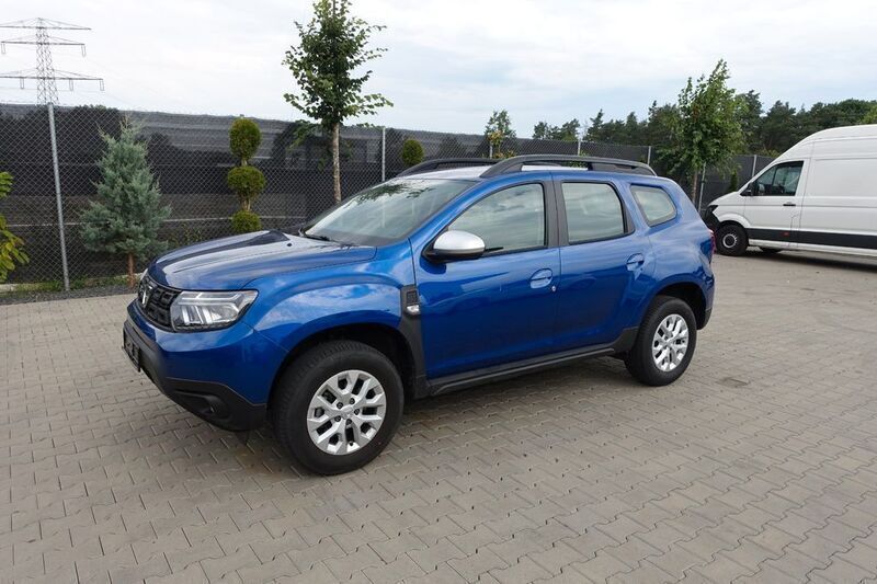 Blau Gebraucht 2024 Dacia Duster Comfort SUV | 14.990 € - Bild 1/4