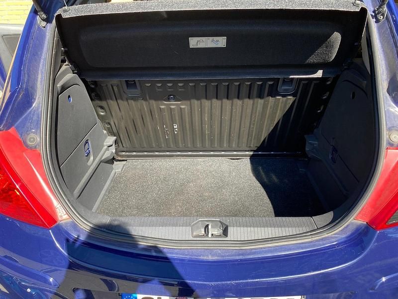 Gebraucht Opel Corsa 65 PS (47 kW) 2012 Blau Kleinwagen