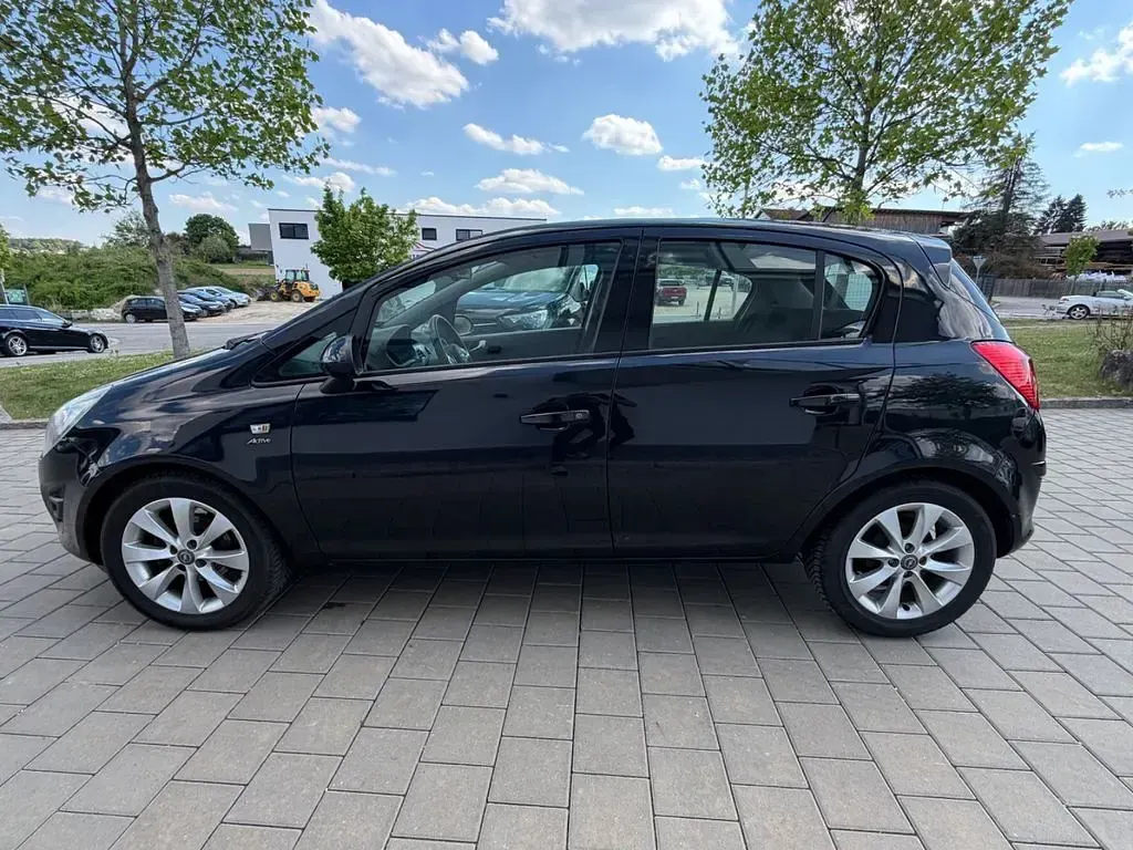 Gebraucht Opel Corsa Active 87 PS (63 kW) 2014 Schwarz Kleinwagen