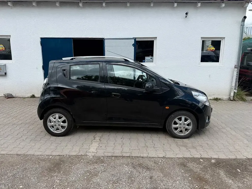 Second-hand Chevrolet Spark LS 82 CP (60 kW) 2011 Negru Hatchback