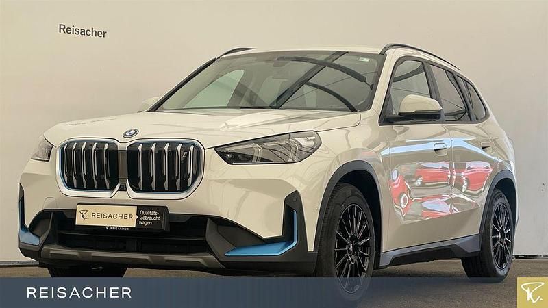 Alpinweiss Gebraucht 2023 BMW iX1 Shadowline SUV | 37.119 € (Guter Preis) - Bild 1/4