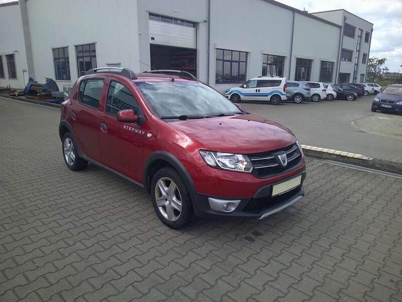 Feuerrot Gebraucht 2014 Dacia Sandero Prestige Kleinwagen | 4.700 € (Fairer Preis) - Bild 1/4