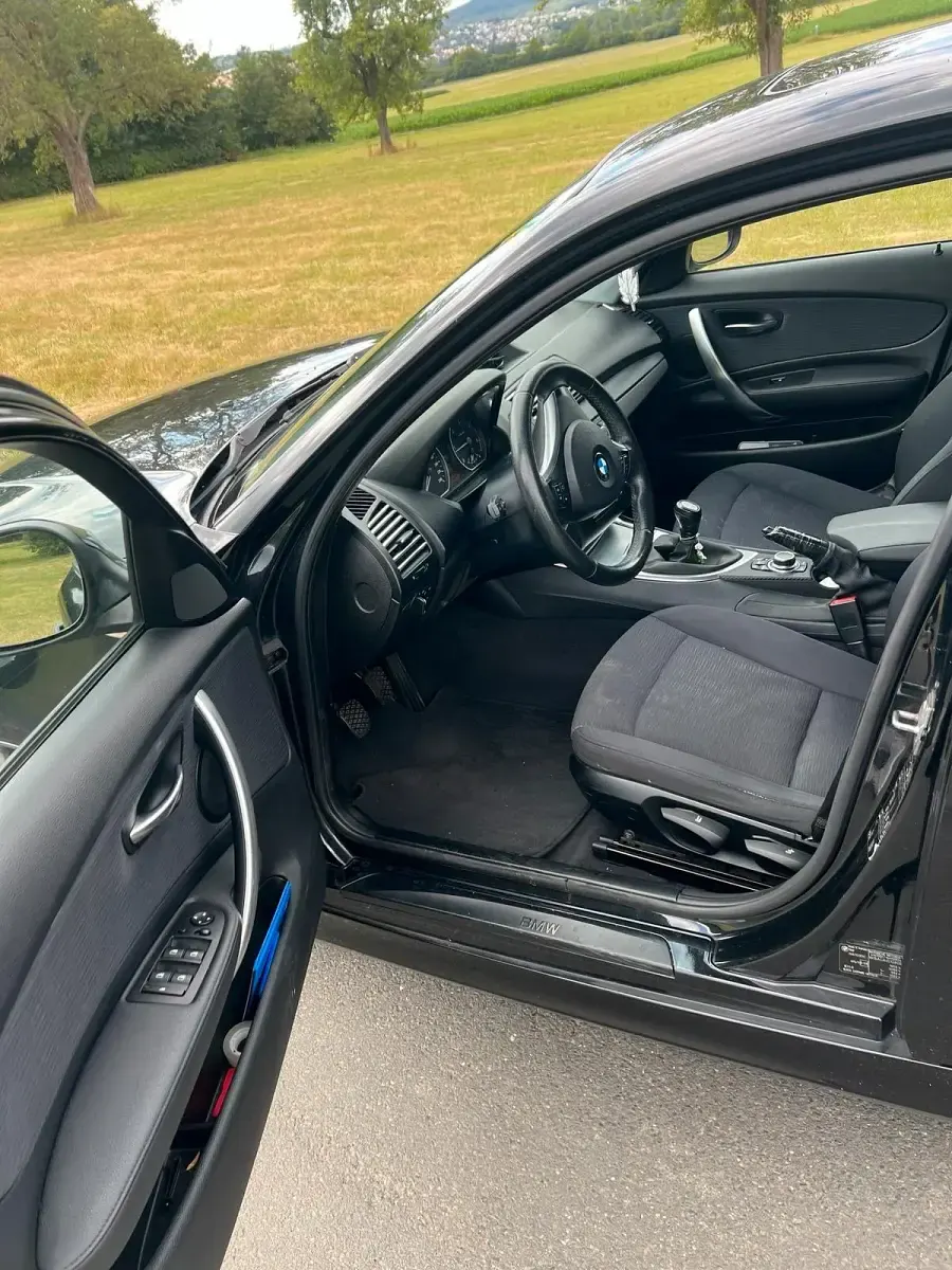 Gebraucht BMW 116 116 PS (85 kW) 2010 Schwarz Kleinwagen