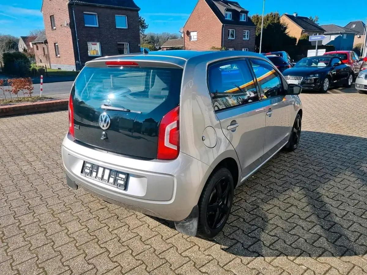 Używany VW up! Cup 60 KM (44 kW) 2014 Szary Hatchback