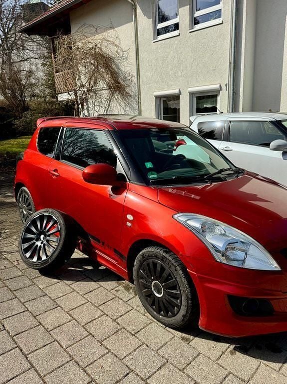 Gebraucht Suzuki Swift Comfort 94 PS (69 kW) 2011 Orange Kleinwagen