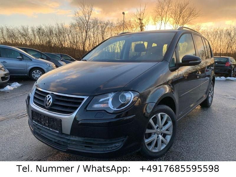 Schwarz Gebraucht 2010 VW Touran Freestyle Van / Kleinbus | 7.900 € (Fairer Preis) - Bild 1/4
