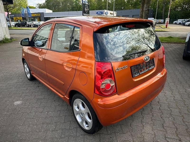 Second-hand Kia Picanto 65 CP (47 kW) 2009 Portocaliu Hatchback