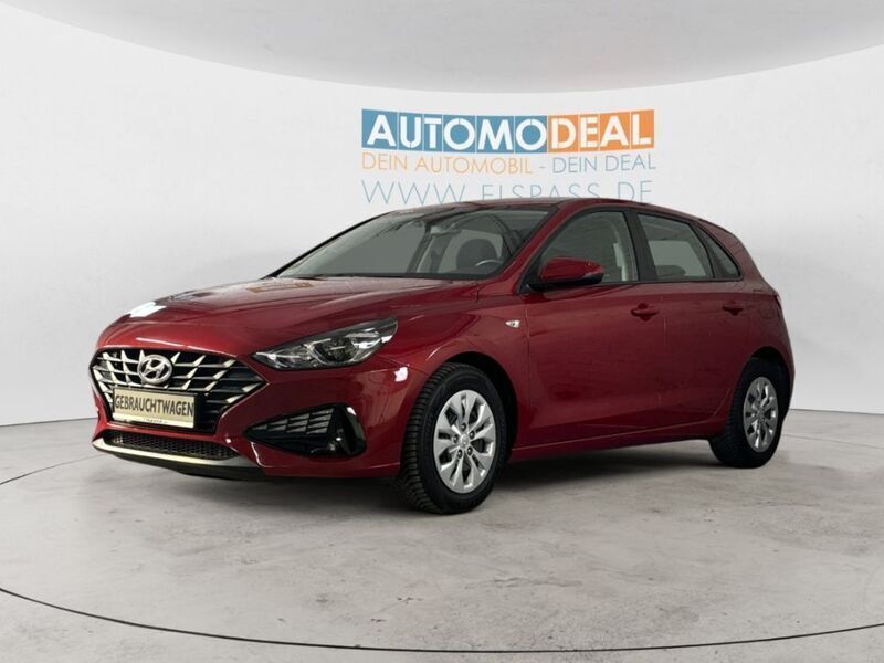 Sunset red / mic Gebraucht 2023 Hyundai i30 Limousine | 14.997 € (Superpreis) - Bild 1/4